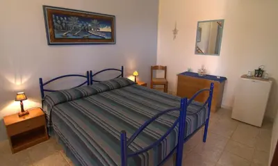 Letto o letti in una camera di Agriturismo Marongiu