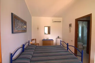Letto o letti in una camera di Agriturismo Marongiu