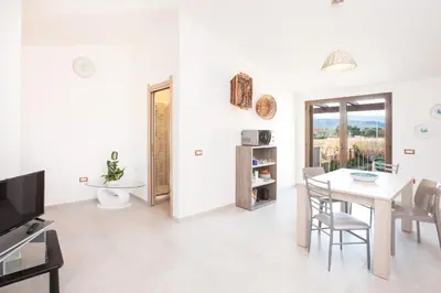 TV o dispositivi per l'intrattenimento presso Villino Enzo 350 mt Baia di Porto Frailis