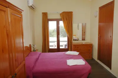Letto o letti in una camera di Hotel Paola