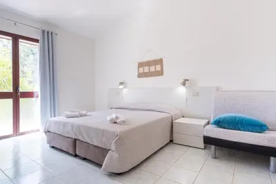 Letto o letti in una camera di Residence Cort'e Accas