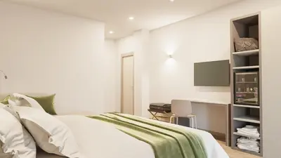 Letto o letti in una camera di Hotel Stele di Nora