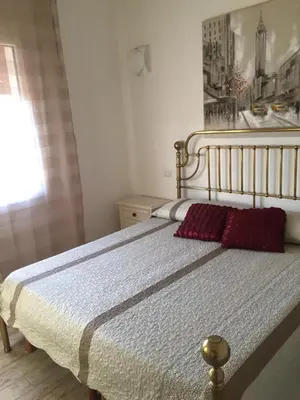 Letto o letti in una camera di Nuovo Appartamento In Centro