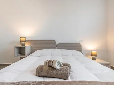 Letto o letti in una camera di Casa Dani