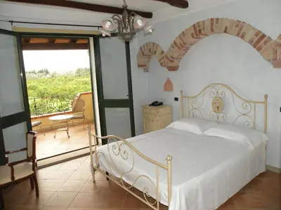Letto o letti in una camera di Su Canonigu Agriresort - Rooms & Glamping