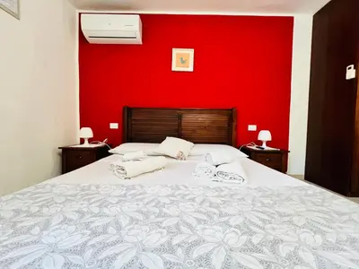 Letto o letti in una camera di bbmaredellestelle
