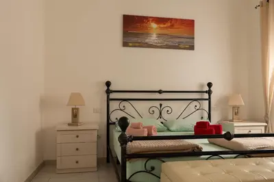 Letto o letti in una camera di Casa Corona