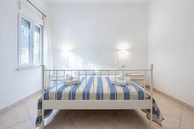 Letto o letti in una camera di Casa Lupa Magnifica con Giardino