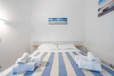 Letto o letti in una camera di Casa Lupa Magnifica con Giardino