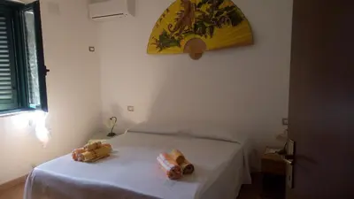 Letto o letti in una camera di B&B da Giusy