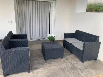 Area soggiorno di AppartArbus white suite