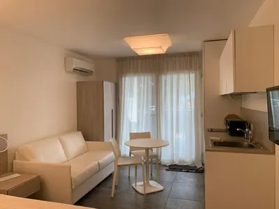 Area soggiorno di AppartArbus white suite