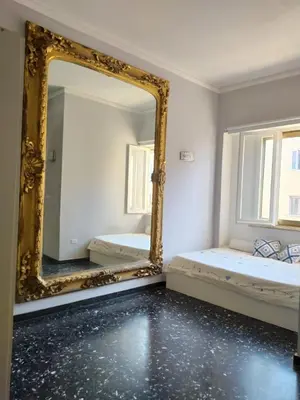 Letto o letti in una camera di Antichi Riflessi suite