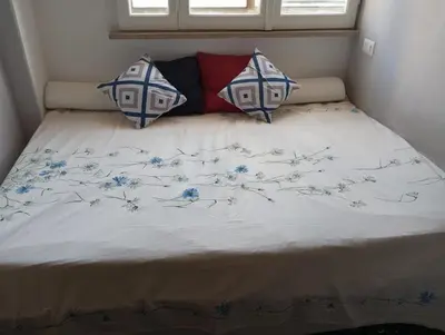Letto o letti in una camera di Antichi Riflessi suite