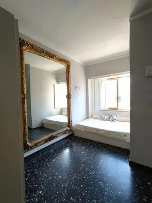 Letto o letti in una camera di Antichi Riflessi suite