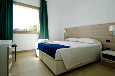 Letto o letti in una camera di Villa Marianna