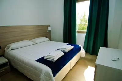 Letto o letti in una camera di Villa Marianna