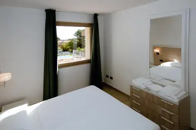 Letto o letti in una camera di Villa Marianna