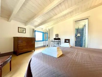 Letto o letti in una camera di Il Carrubo & SPA