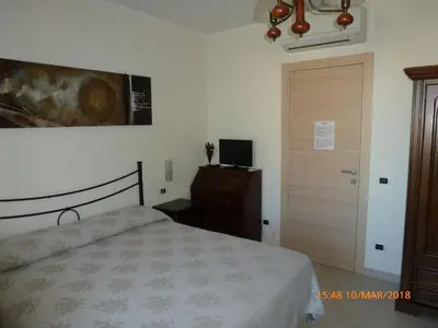 Letto o letti in una camera di Emozioni d'estate