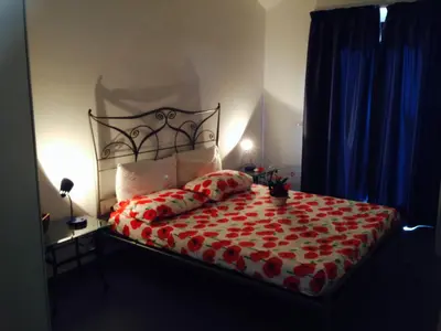 Letto o letti in una camera di Villa Aurora