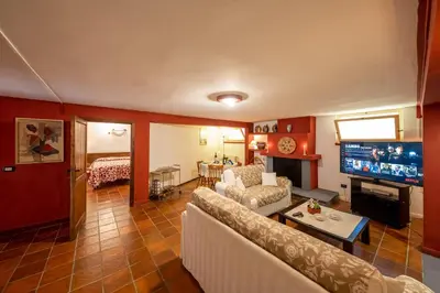 TV o dispositivi per l'intrattenimento presso Tavernetta Apartment