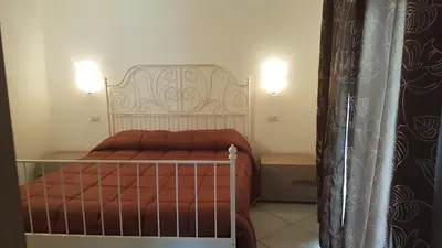 Letto o letti in una camera di Milly Apartment