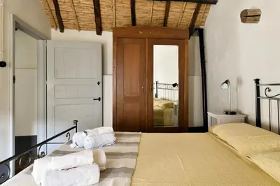 Letto o letti in una camera di Un gioiello nel centro storico