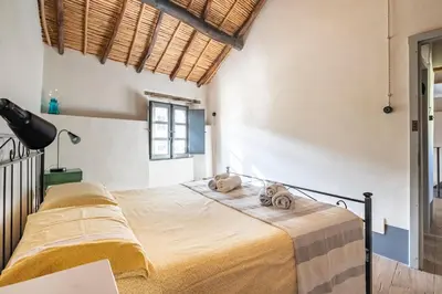 Letto o letti in una camera di Un gioiello nel centro storico