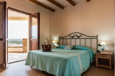 Letto o letti in una camera di Residenza Petrera