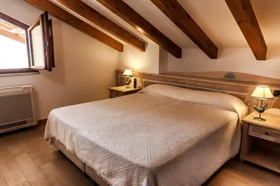 Letto o letti in una camera di Residenza Petrera