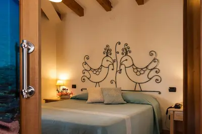 Letto o letti in una camera di Residenza Petrera
