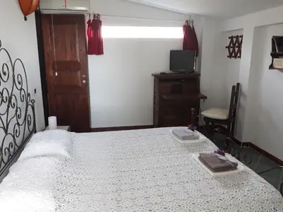 Letto o letti in una camera di Villa delle torri