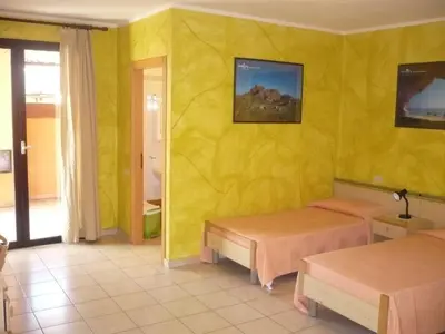 Letto o letti in una camera di Rosa Hotel