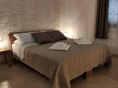 Letto o letti in una camera di Nell'Azzurro