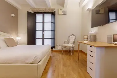 Letto o letti in una camera di Martini Castello Boutique Rooms
