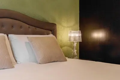 Letto o letti in una camera di Martini Castello Boutique Rooms