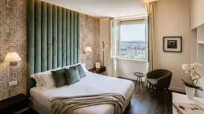 Letto o letti in una camera di Birkin Marina
