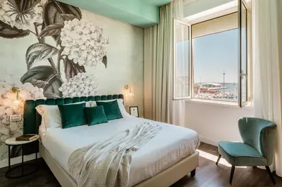 Letto o letti in una camera di Birkin Marina