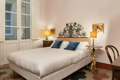 Letto o letti in una camera di Bellezza Suites