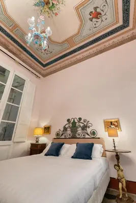 Letto o letti in una camera di Bellezza Suites