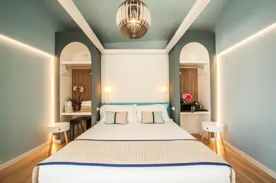 Letto o letti in una camera di Hotel New Barcavela