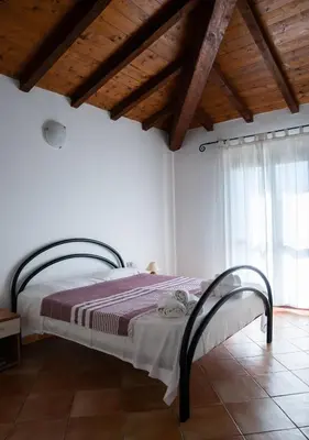 Letto o letti in una camera di Residence del sole