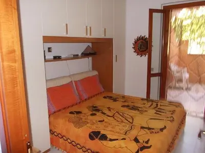 Letto o letti in una camera di Violet Garden - Villasimius