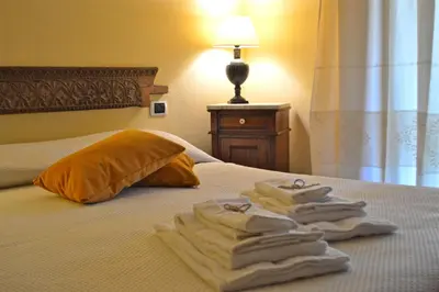 Letto o letti in una camera di Villa Charlie