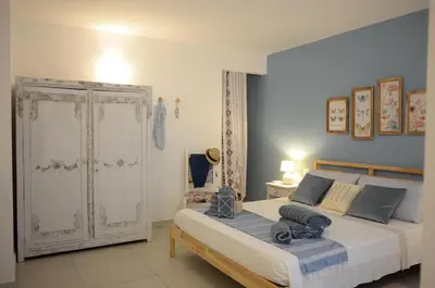 Letto o letti in una camera di Villa Sangemi