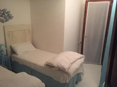 Letto o letti in una camera di Casa Vacanza Porto Luna 68