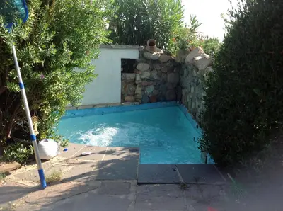 Piscina di Casa Vacanza Porto Luna 68 o nelle vicinanze