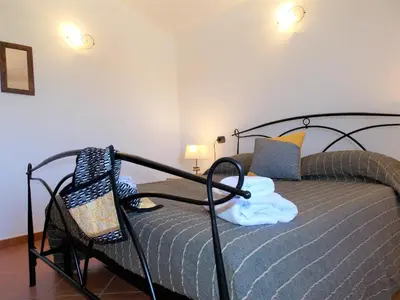 Letto o letti in una camera di Shardana Blu - Net Zero Home Holiday