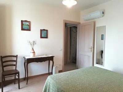 Letto o letti in una camera di S'eredeu Apartments